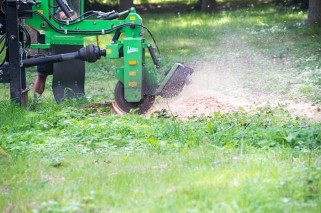 Stump grinding equipment removing a tree stump from a residential yard in Streetsboro, OH